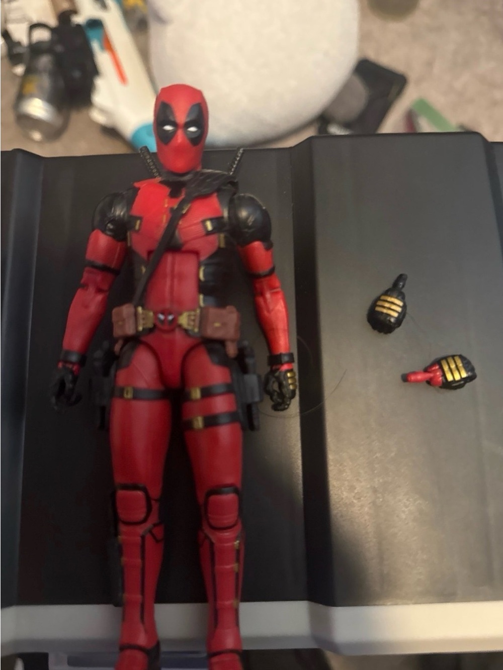 Marvel Red and Black Deadpool Action Figure with Accessory Hands